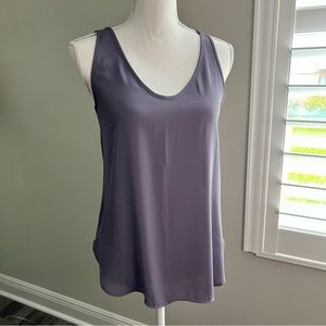 Sleeveless blouse Loft XS. Runs big. Plum, comfortable. Like New.